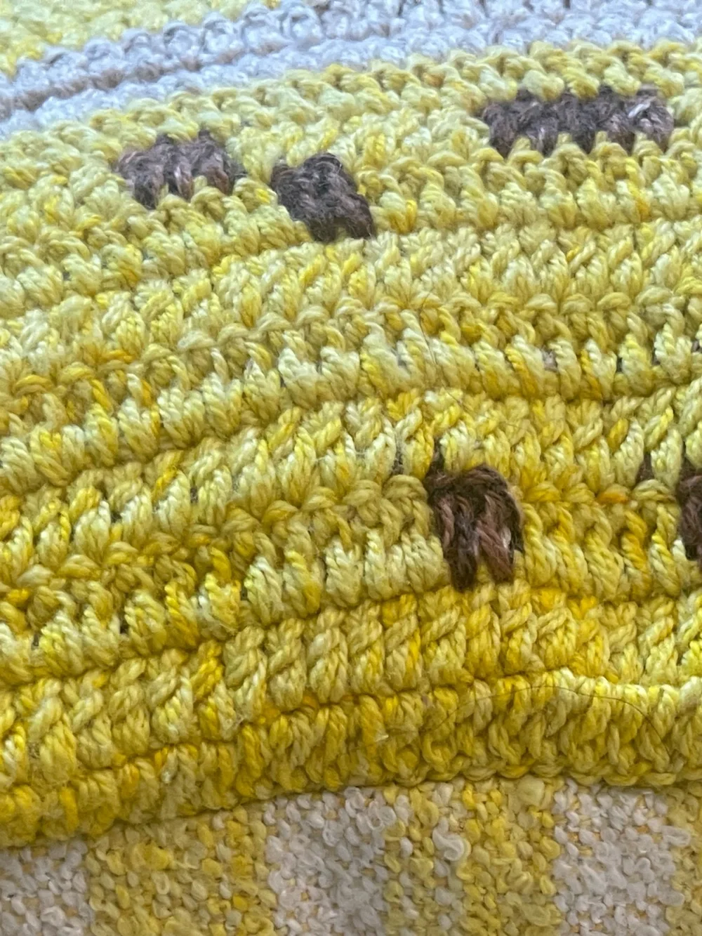 Woven Banana Pillow from Anthropologie.